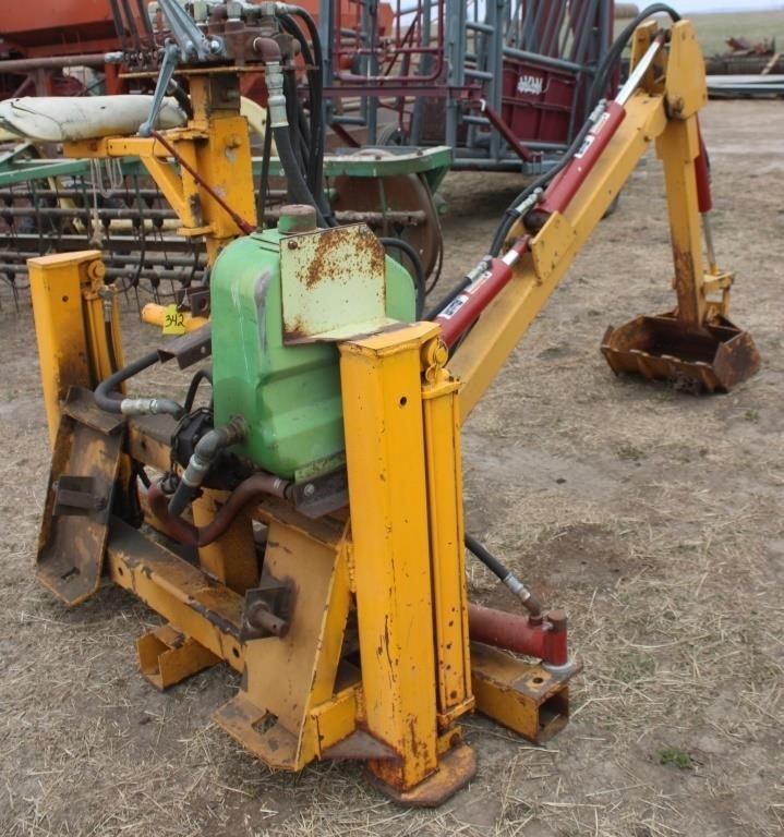 Skidsteer mount backhoe