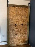 Barn door project- hardware there, needs shiplap