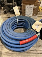 Roll of pressure washer hose