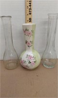 3 vases. Floral and glass. 7.5in and 9in tall. No