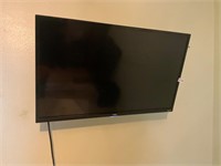 TCL 32” flat screen with wall mount and remote