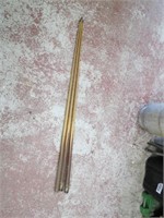 (3)vintage pool cue sticks.