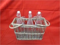 Basket w/glass bottles.