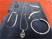 Sterling silver marked bracelets, necklace, ring.