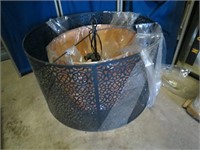 Large metal hanging light fixture.