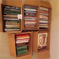 Upstairs: Five (5) large boxes of books incl.