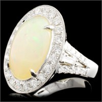 14K Gold Ring: 4.70ct Opal, 1.31ctw Diam