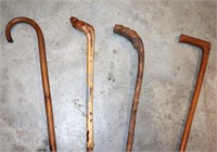 4 wooden walking sticks / canes
