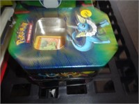 POKEMON TIN W CARDS