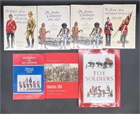 7 COLLECTIBLE METAL SOLDIER BOOKS