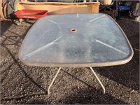 Glass top patio table