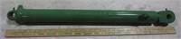 2 green hydraulic cylinders, approx. 36" long