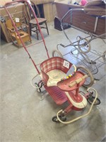 Is vintage red stroller.