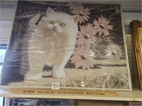 Large framed cat painting.