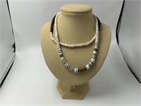 Pair of handmade shell disc necklaces