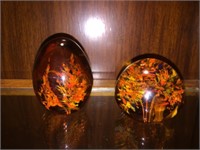 2 AMBER GLASS PAPER WEIGHTS