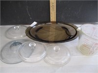 Pyrex 1 qt measuring cup, 3 lids, glass platter