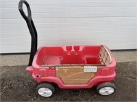 Red plastic children’s wagon