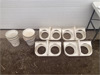 4 calf feeders with 6 pails