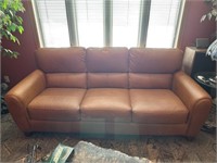 Tan Leather Couch and loveseat set.