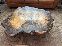 Burl and epoxy coffee table with moss inlays.