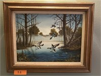 Mallard ducks landing in timber framed painting.