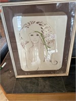 Large framed print of a woman in a hat by Tara.