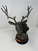 Brass elk sculpture made in China.