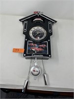 Collectible corvette pendulum clock.