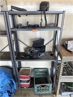 Metal shelf with misc items.
