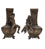 A pair Of European Spelter Vases Decorated With Ea