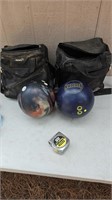 2 bowling balls in bags