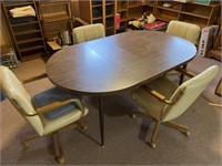 Table & Chairs with 4 Chairs on wheels 70”