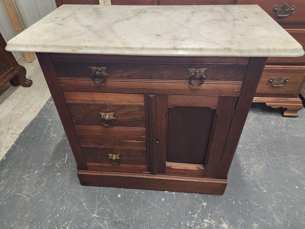 wash stand with over sized marble top. 3 drawer