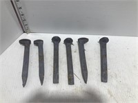 6 railroad spikes