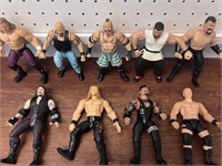 Lot of 9 Titan wrestling figures 1998 WWE/WWF