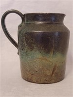 Signed hand made pottery pitcher