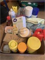Box of light bulbs and cleaning supplies