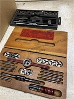 Tap and die set with miscellaneous within the