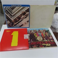 Four (4) The Beatles Albums.