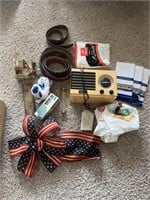 Contents of box - (old radio, belts, misc)