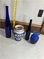 Blue glassware lot. Tall blue bottle. Blue vase
