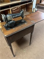 Old Singer Sewing Machine in Cabinet