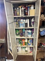 Metal cabinet full of cleaning supplies
