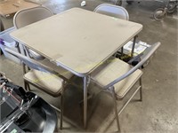 5ct Folding table and 4ct folding chairs (Ripped)