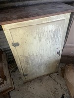 Antique wooden cabinet with contents