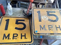 (2) speed limit signs