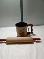 One androck sifter one wooden rolling pin