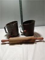 2 bromwell's sifter and 1 wooden rolling pin