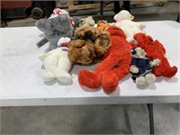 Assorted bears and Elmo toys